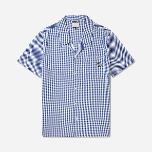 Sage collar shirt from Tonsure with short sleeves. Made in a gingham mini check seersucker quality with a wavy texture. Chest pocket with Teddy logo badge - Perfect for hot summer days.