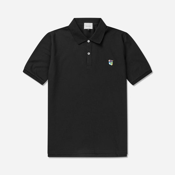 Polo shirt ss with round neck in a regular fit. 100% soft and light quality cotton, adorned with Tonsure teddy badge on the chest. Color: Black