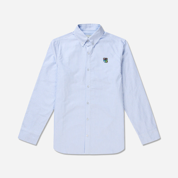 Tonsures statement shirt style is cut from wrinkle-resistant cotton Oxford, embroidered with the iconic Teddy logo at the chest pocket. The shirt has a button-down collar to ensure neat layering under a jacket.