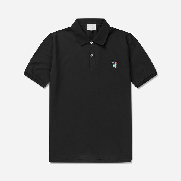Softest Polo shirt short sleeved, with round neck in a regular fit. 100% soft and light quality cotton, adorned with Tonsure teddy badge on the chest. Fashion Polo black - Tonsure
